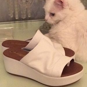 A. Giannetti slip on white sandals